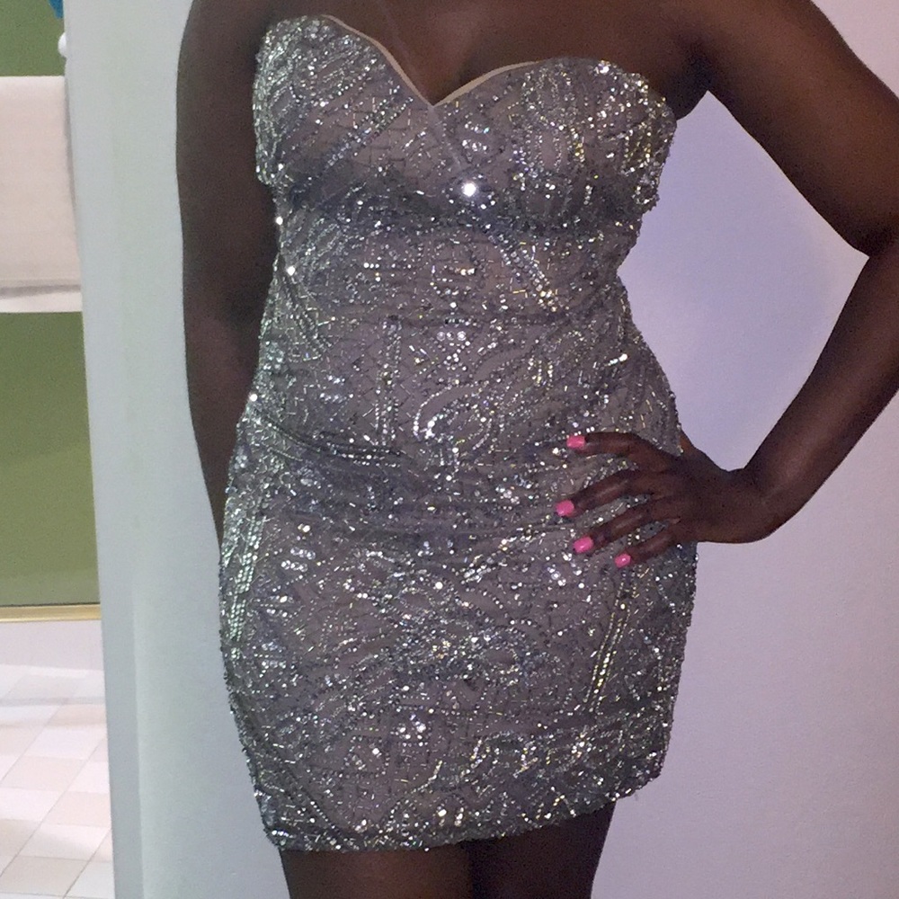 Glitter dress! You’ll be sure to turn heads with this number! Only worn twice!